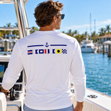 Back of white Captain UPF 50 shirt with nautical signal flags and anchor
